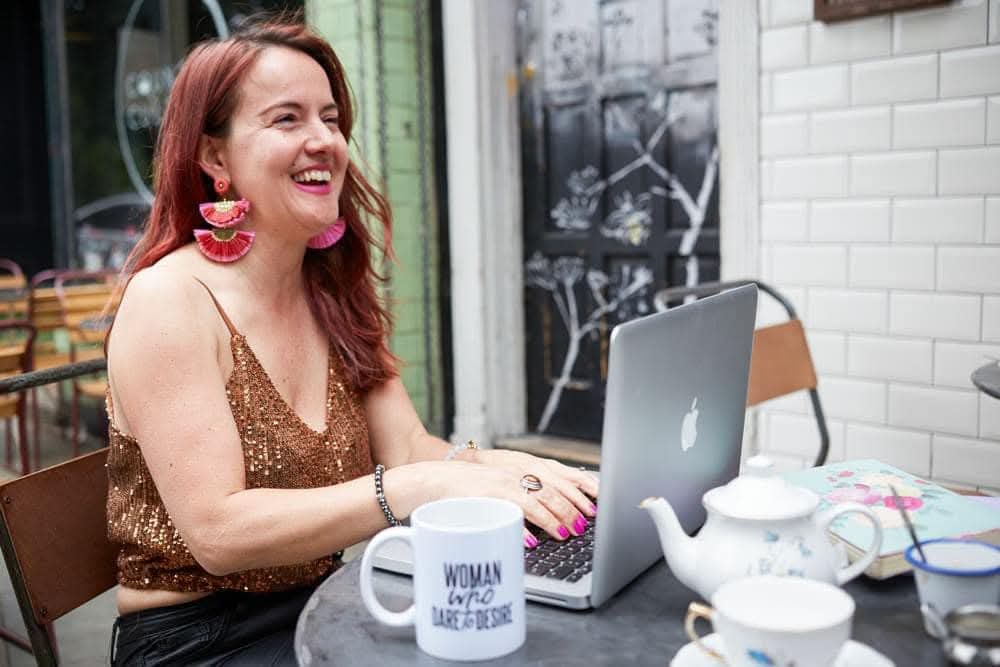 Julia Schmitz working from home with laptop